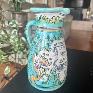Artisan Ceramic Pitcher with Floral Motif